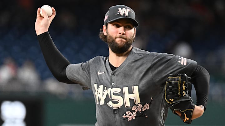 Sep 27, 2024; Washington, District of Columbia, USA;  Washington Nationals pitcher Trevor Williams (32) delivers a first inning pitch against the Philadelphia Phillies at Nationals Park.