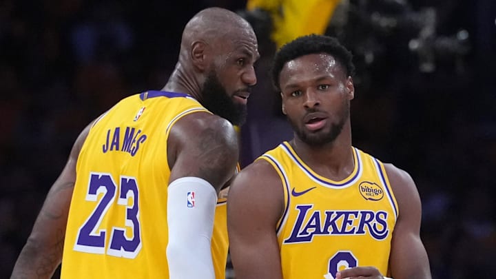 Los Angeles Lakers forward LeBron James (23) with son Bronny James (9)