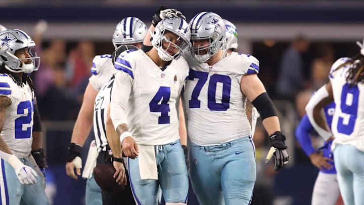 Dallas Cowboys quarterback Dak Prescott and guard Zack Martin celebrate during the second half against the Seattle Seahawks. Dallas Cowboys quarterback Dak Prescott and guard Zack Martin celebrate during the second half against the Seattle Seahawks.
