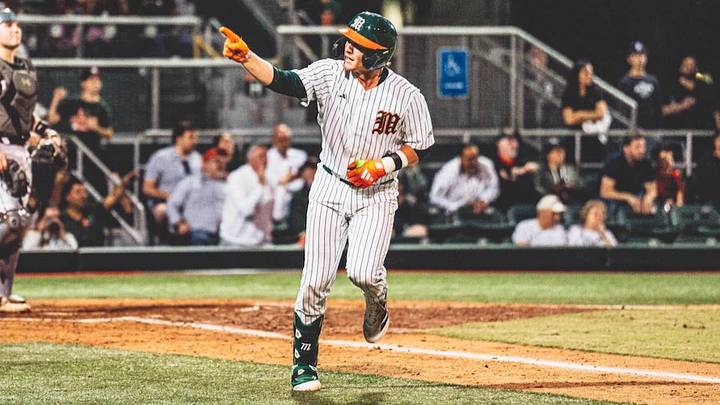 Miami cather Alex Sosa smashing a homerun against lehigh during opening weekend