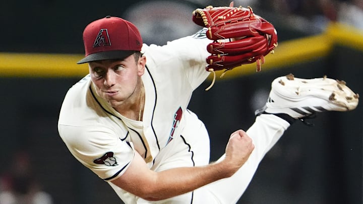 Arizona Diamondbacks pitcher Brandon Pfaadt (32) throws to the Los Angeles Dodgers in the second inning at Chase Field in Phoenix on Sept. 23, 2025. Arizona Diamondbacks pitcher Brandon Pfaadt (32) throws to the Los Angeles Dodgers in the second inning at Chase Field in Phoenix on Sept. 23, 2025.
