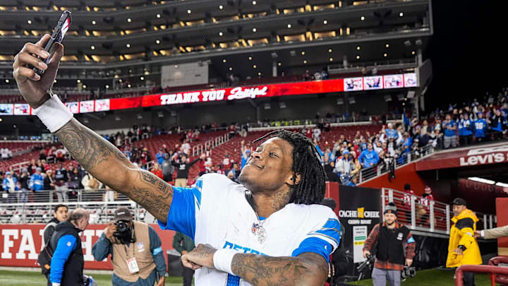 Detroit Lions wide receiver Jameson Williams (9) takes a selfie to celebrate 40-34 win over San Francisco 49ers Detroit Lions wide receiver Jameson Williams (9) takes a selfie to celebrate 40-34 win over San Francisco 49ers