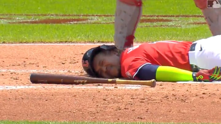 Cleveland Guardians 3B Jose Ramirez lays in the dirt after getting hit by a pitch against the Cincinnati Reds. Cleveland Guardians 3B Jose Ramirez lays in the dirt after getting hit by a pitch against the Cincinnati Reds.