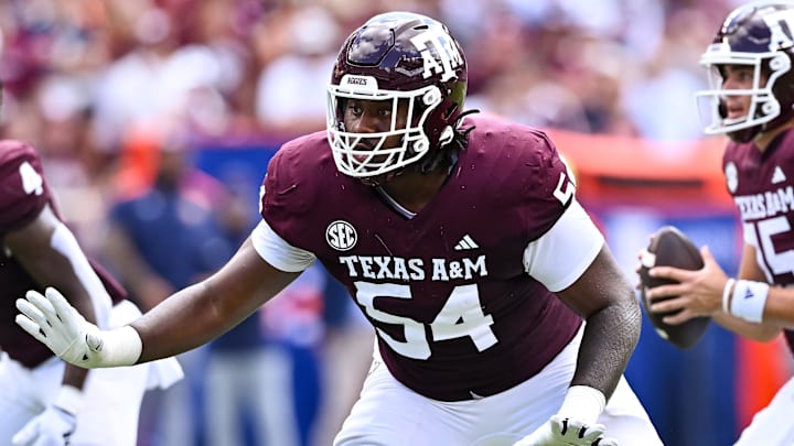 Sep 23, 2023; College Station, Texas, USA; Texas A&M Aggies offensive lineman Mark Nabou Jr. (54) in action during the first half against the Auburn Tigers at Kyle Field. Mandatory Credit: Maria Lysaker-Imagn Images