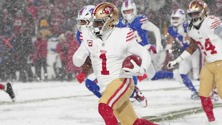 Dec 1, 2024; Orchard Park, New York, USA; San Francisco 49ers wide receiver Deebo Samuel Sr. (1) returns a kick off against the Buffalo Bills during the second half at Highmark Stadium. Mandatory Credit: Gregory Fisher-Imagn Images