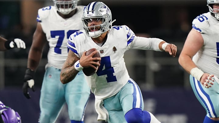 Dallas Cowboys quarterback Dak Prescott scrambles during the second half against the Minnesota Vikings. Dallas Cowboys quarterback Dak Prescott scrambles during the second half against the Minnesota Vikings.