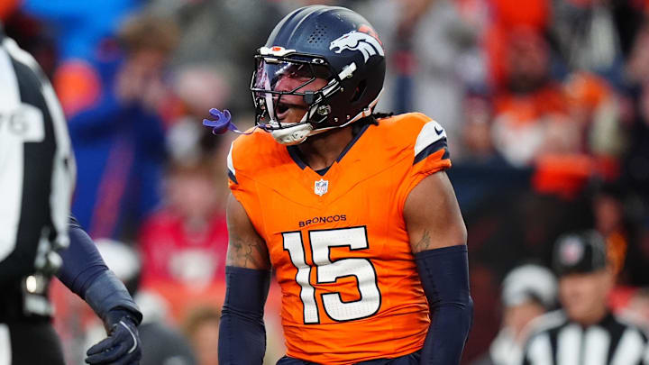 Nov 17, 2024; Denver, Colorado, USA; Denver Broncos linebacker Nik Bonitto (15) celebrates his sack in the second half against the Atlanta Falcons at Empower Field at Mile High. 