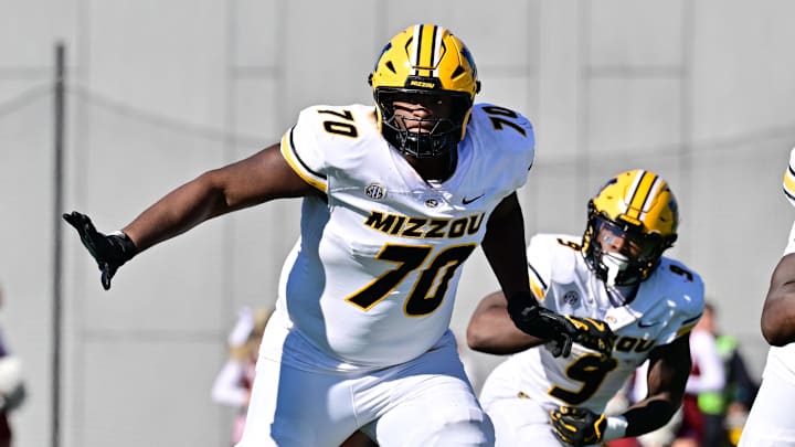 Oct 12, 2024; Amherst, Massachusetts, USA; Missouri Tigers offensive lineman Cayden Green (70) in action during the second half against the Massachusetts Minutemen at Warren McGuirk Alumni Stadium. Mandatory Credit: Eric Canha-Imagn Images
