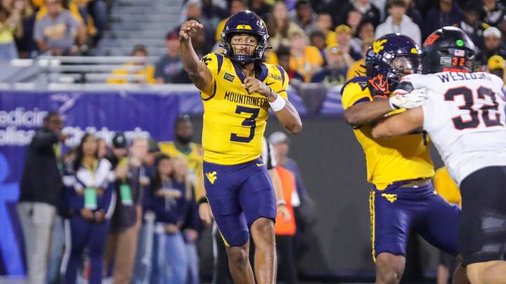 Sep 26, 2026; Morgantown, West Virginia, USA;  West Virginia Mountaineers quarterback Michael Hawkins Jr. (3) throws a pass during the first quarter against the Oklahoma State Cowboys at Milan Puskar Stadium.  Mandatory Credit: Ben Queen-Imagn Images
