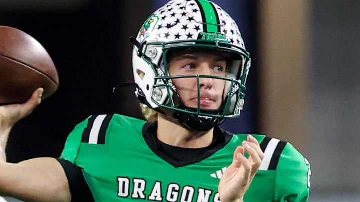 Southlake Carroll quarterback Angelo Renda passed for 235 yards and 2 touchdowns in the first half to help the No. 1 Southlake Carroll Dragons beat Denton Guyer 51-19 and advance to the semifinals of the UIL 6A Division II playoffs on Saturday at Crowley ISD Stadium. Southlake Carroll quarterback Angelo Renda passed for 235 yards and 2 touchdowns in the first half to help the No. 1 Southlake Carroll Dragons beat Denton Guyer 51-19 and advance to the semifinals of the UIL 6A Division II playoffs on Saturday at Crowley ISD Stadium.