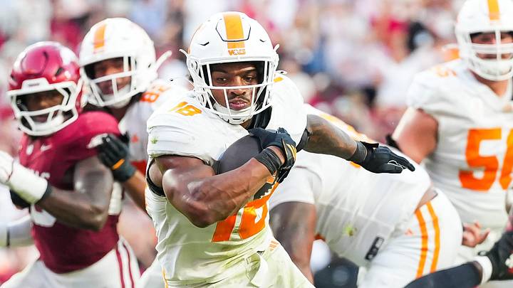 Tennessee running back DeSean Bishop (18) fights his way into the end zone for the game-sealing touchdown during a college football game between Tennessee and Arkansas at Donald W. Reynolds Razorback Stadium in Fayetteville, Ark., on Oct. 10, 2026.
