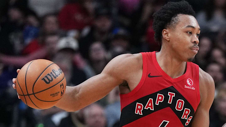 Toronto Raptors forward Scottie Barnes controls the ball.