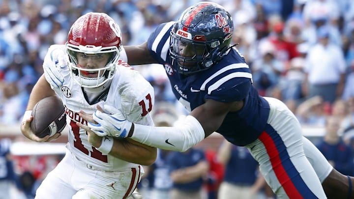 Mississippi Rebels linebacker Suntarine Perkins (4) sacks Oklahoma Sooners quarterback Jackson Arnold Mississippi Rebels linebacker Suntarine Perkins (4) sacks Oklahoma Sooners quarterback Jackson Arnold