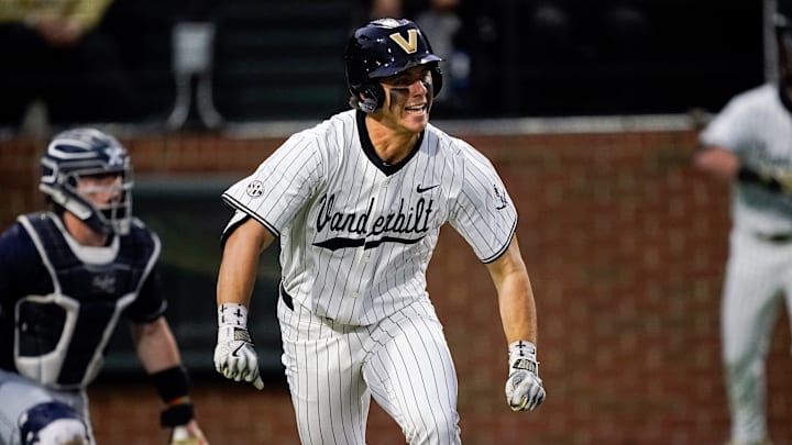 Vanderbilt first baseman Riley Nelson (32) watches his RBI single against Xavier during the fourth inning at Hawkins Field in Nashville, Tenn., Friday, March 7, 2025. Vanderbilt won 15-3 in seven innings.