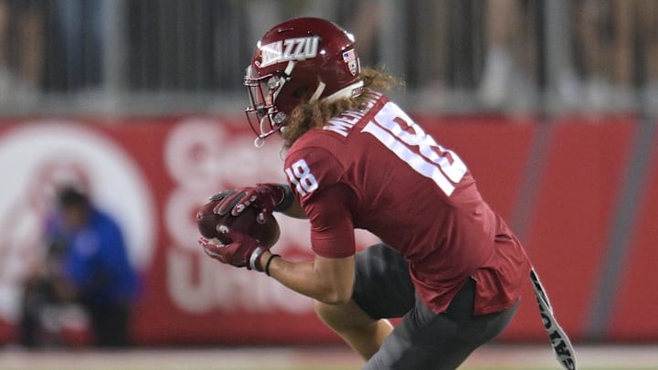 Sep 20, 2024; Pullman, Washington, USA; Washington State Cougars wide receiver Josh Meredith (18) makes a catch against the San Jose State Spartans in the first half at Gesa Field at Martin Stadium. Mandatory Credit: James Snook-Imagn Images