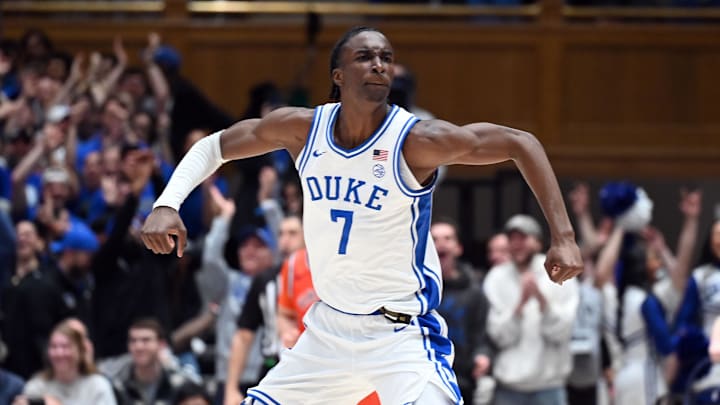 Feb 28, 2026; Durham, North Carolina, USA;Duke Blue Devils forward Dame Sarr (7) reacts after hitting a three-pointer during the first half against the Virginia Cavaliers at Cameron Indoor Stadium. Mandatory Credit: Rob Kinnan-Imagn Images