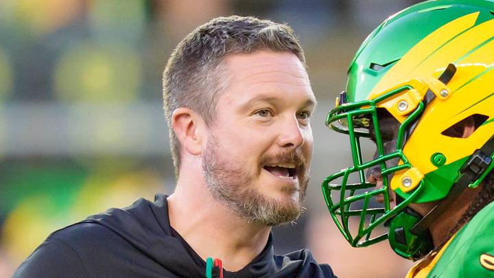 Oregon head coach Dan Lanning, left, talks to Oregon offensive lineman Dave Iuli as the Oregon Ducks host the Portland State Vikings on Sept. 18, 2026, at Autzen Stadium in Eugene, Oregon. Oregon head coach Dan Lanning, left, talks to Oregon offensive lineman Dave Iuli as the Oregon Ducks host the Portland State Vikings on Sept. 18, 2026, at Autzen Stadium in Eugene, Oregon.