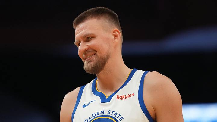 Apr 5, 2026; San Francisco, California, USA; Golden State Warriors forward Kristaps Porzingis (7) smiles during a break in the action against the Houston Rockets in the second quarter at the Chase Center. Mandatory Credit: Cary Edmondson-Imagn Images