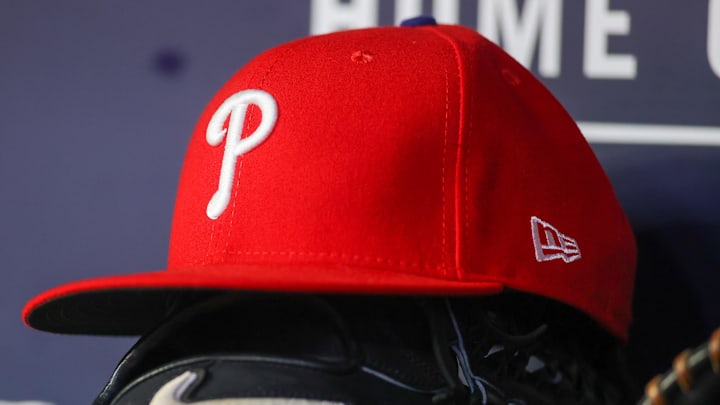 May 26, 2023; Atlanta, Georgia, USA; A detailed view of a Philadelphia Phillies hat and glove on the bench against the Atlanta Braves in the seventh inning at Truist Park. May 26, 2023; Atlanta, Georgia, USA; A detailed view of a Philadelphia Phillies hat and glove on the bench against the Atlanta Braves in the seventh inning at Truist Park.