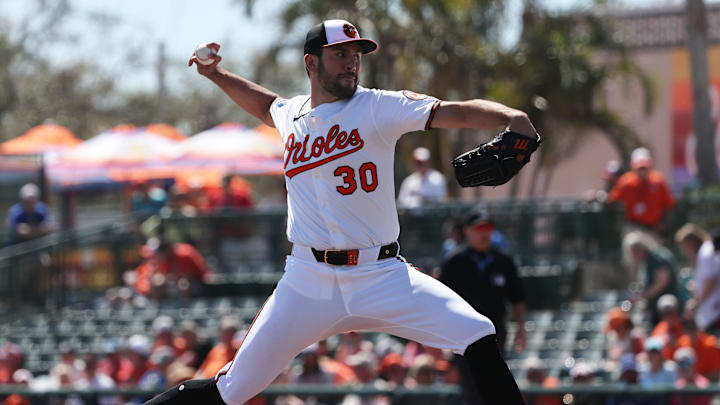 Feb 27, 2025; Sarasota, Florida, USA; Baltimore Orioles starting pitcher Grayson Rodriguez (30) throws a pitch during the first inning against the Toronto Blue Jays  at Ed Smith Stadium. 