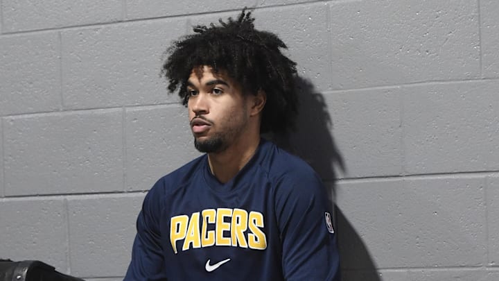 Indiana Pacers guard Ethan Thompson (55) warms up before the game against the Charlotte Hornets at the Spectrum Center.