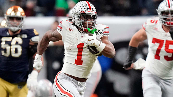 Ohio State Buckeyes running back Quinshon Judkins (1) gets away from the Notre Dame Fighting Irish defense for a long run in the third quarter during the College Football Playoff championship at Mercedes-Benz Stadium in Atlanta on January 20, 2025. Ohio State Buckeyes running back Quinshon Judkins (1) gets away from the Notre Dame Fighting Irish defense for a long run in the third quarter during the College Football Playoff championship at Mercedes-Benz Stadium in Atlanta on January 20, 2025.