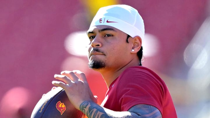 Oct 11, 2025; Los Angeles, California, USA;  USC Trojans quarterback Jayden Maiava (14) warms up prior to the game against the Michigan Wolverines at United Airlines Field at the Los Angeles Memorial Coliseum. Mandatory Credit: Jayne Kamin-Oncea-Imagn Images