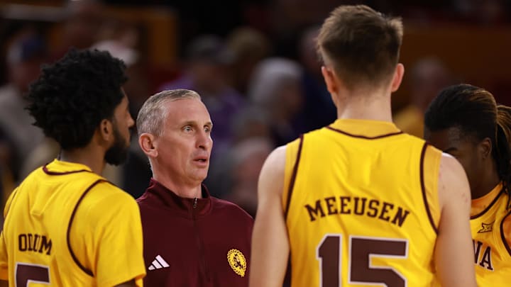 Jan 10, 2026; Tempe, Arizona, USA; Arizona State Sun Devils head coach Bobby Hurley in the huddle with his players against the Kansas State Wildcats in the first half at Desert Financial Arena. Mandatory Credit: Mark J. Rebilas-Imagn Images
