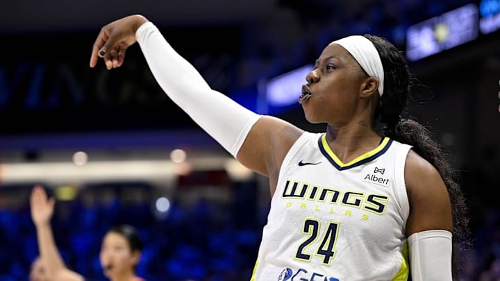 Jul 28, 2025; Arlington, Texas, USA; Dallas Wings guard Arike Ogunbowale (24) follows through on a shot against the New York Liberty during the first half at College Park Center. Mandatory Credit: Jerome Miron-Imagn Images