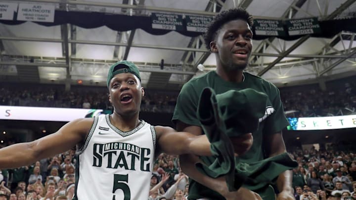 Michigan State guard Cassius Winston (5) and forward Gabe Brown celebrate the 80-69 win against Ohio State on Sunday, March 8, 2020 at the Breslin Center.

Michigan State