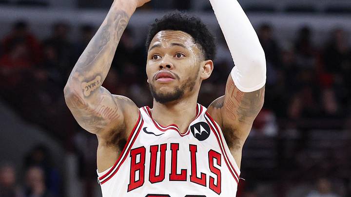 Feb 19, 2026; Chicago, Illinois, USA; Chicago Bulls guard Anfernee Simons (22) shoots against the Toronto Raptors during the second half at United Center. Mandatory Credit: Kamil Krzaczynski-Imagn Images