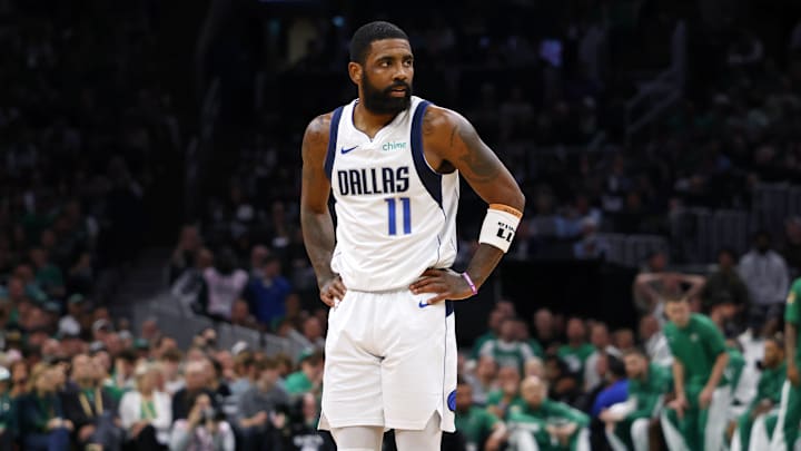 Jun 9, 2024; Boston, Massachusetts, USA; Dallas Mavericks guard Kyrie Irving (11) reacts after a play against the Boston Celtics during the first quarter in game two of the 2024 NBA Finals at TD Garden. Mandatory Credit: Peter Casey-Imagn Images