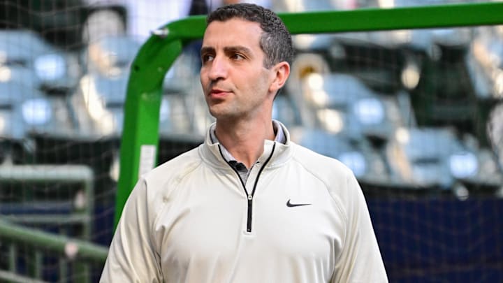 Sep 28, 2024; Milwaukee, Wisconsin, USA;   New York Mets president of baseball operations David Sterns watches batting practice before a game against the Milwaukee Brewers at American Family Field. 