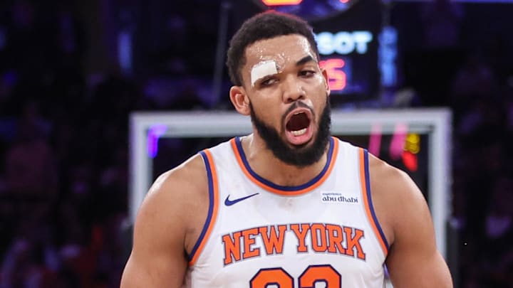 Feb 4, 2026; New York, New York, USA;  New York Knicks center Karl-Anthony Towns (32) celebrates in the fourth quarter against the Denver Nuggets at Madison Square Garden. Mandatory Credit: Wendell Cruz-Imagn Images