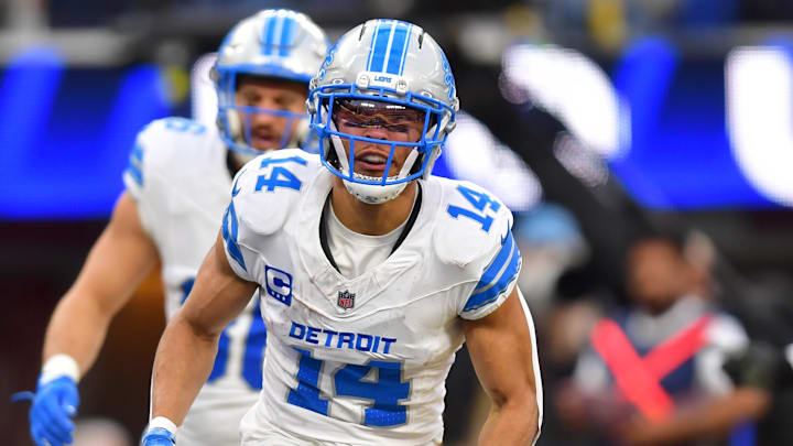 Detroit Lions wide receiver Amon-Ra St. Brown (14) celebrates after a touchdown during the second quarter