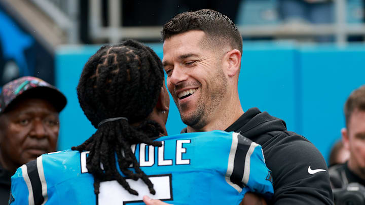 Carolina Panthers head coach Dave Canales and running back Rico Dowdle