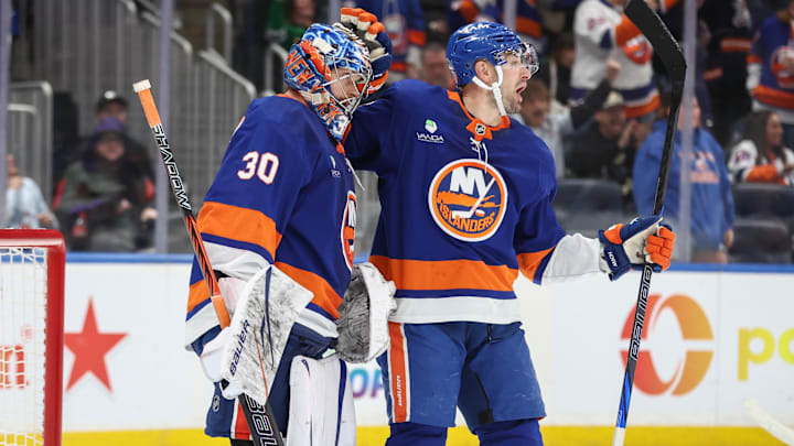 Mar 26, 2026; Elmont, New York, USA;  New York Islanders goaltender Ilya Sorokin (30) is greeted by defenseman Adam Pelech (3) after defeating the Dallas Stars at UBS Arena. Mandatory Credit: Wendell Cruz-Imagn Images