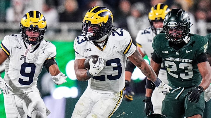 Michigan running back Jordan Marshall (23) runs against Michigan State during the second half at Spartan Stadium in East Lansing on Saturday, October 25, 2025.