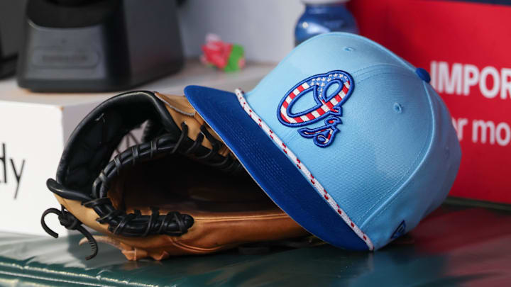 Jul 4, 2025; Atlanta, Georgia, USA; A detailed view of the Baltimore Orioles 4th of July hat in the dugout against the Atlanta Braves in the third inning at Truist Park. 