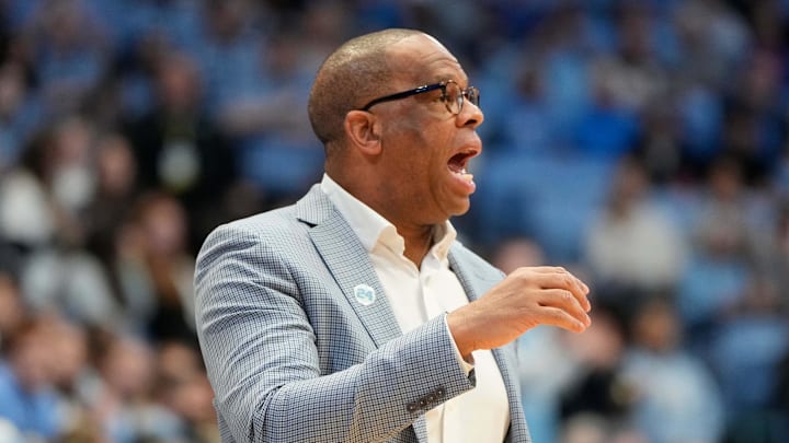 Jan 25, 2025; Chapel Hill, North Carolina, USA;  North Carolina Tar Heels head coach Hubert Davis reacts in the first half at Dean E. Smith Center. Mandatory Credit: Bob Donnan-Imagn Images