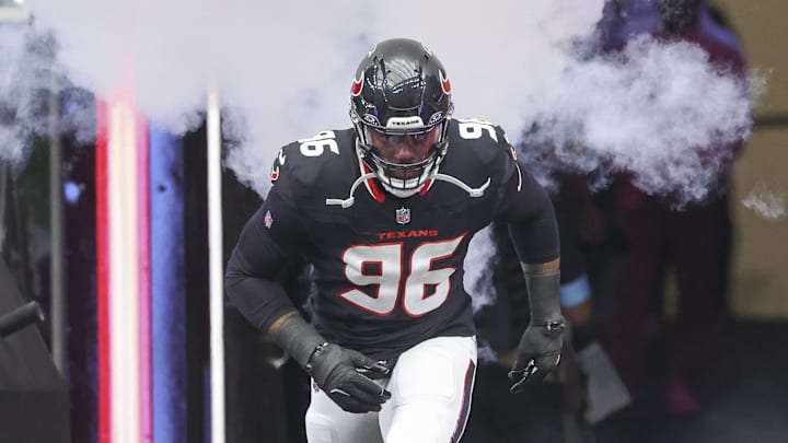 Oct 27, 2024; Houston, Texas, USA; Houston Texans defensive end Denico Autry (96) runs onto the field before the game against the Indianapolis Colts at NRG Stadium. Mandatory Credit: Troy Taormina-Imagn Images