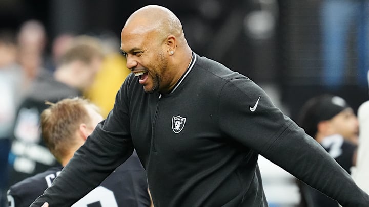Nov 24, 2024; Paradise, Nevada, USA; Las Vegas Raiders head coach Antonio Pierce greets a player before the start of a game against the Denver Broncos at Allegiant Stadium. Mandatory Credit: Stephen R. Sylvanie-Imagn Images