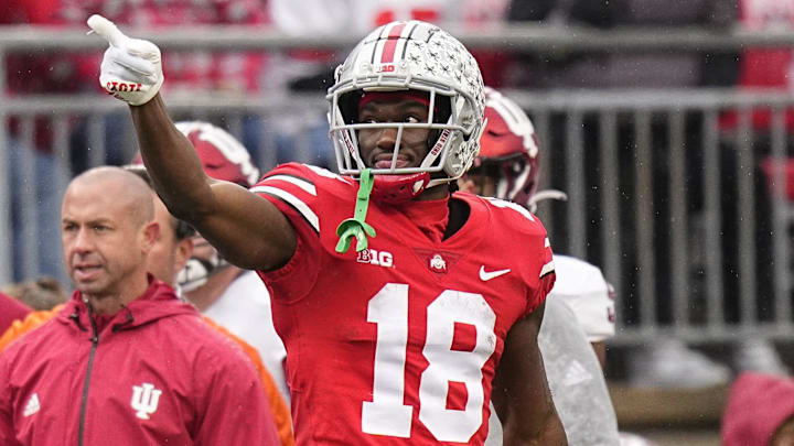 Nov 12, 2022; Columbus, Ohio, USA;  Ohio State Buckeyes wide receiver Marvin Harrison Jr. (18) celebrates a first down catch during the first half of the NCAA football game against the Indiana Hoosiers at Ohio Stadium. Mandatory Credit: Adam Cairns-The Columbus Dispatch