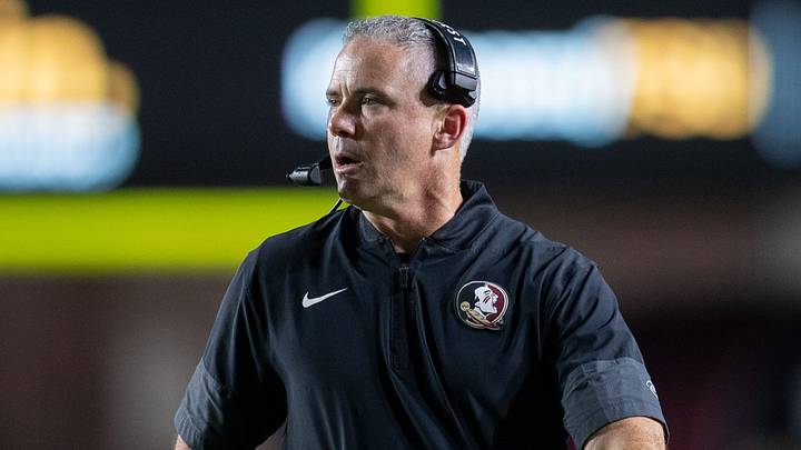 Florida State Seminoles head coach Mike Norvell talks into his headset during a timeout. The Florida State Seminoles defeated the New Mexico State Aggies 34-17 at Doak Campbell Stadium on Saturday, Aug. 29, 2026. Florida State Seminoles head coach Mike Norvell talks into his headset during a timeout. The Florida State Seminoles defeated the New Mexico State Aggies 34-17 at Doak Campbell Stadium on Saturday, Aug. 29, 2026.