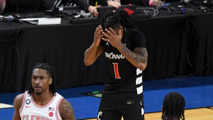 Cincinnati Bearcats guard Day Day Thomas (1) reacts after missing a game-tying shot Sunday, Dec. 21, 2025, after the NCAA men’s basketball game against the Clemson Tigers at Bon Secours Wellness Arena in Greenville, South Carolina. Clemson Tigers won 68-65.