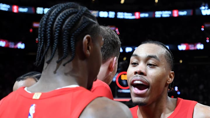 Toronto Raptors forward Scottie Barnes celebrates with forward RJ Barrett.