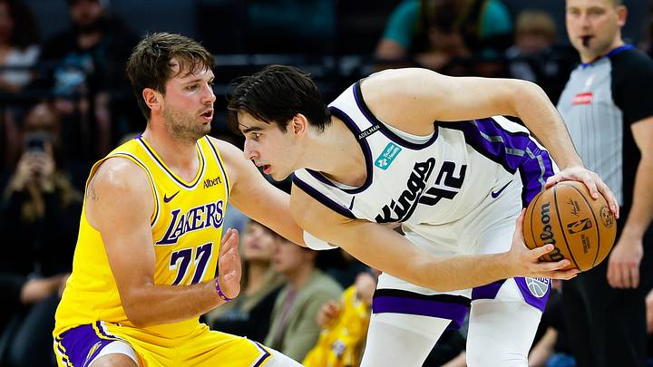 Oct 5, 2026; Sacramento, California, USA; Sacramento Kings center Maxime Raynaud (42) controls the ball against Los Angeles Lakers guard Luka Doncic (77) during the second quarter at Golden 1 Center. Mandatory Credit: Sergio Estrada-Imagn Images Oct 5, 2026; Sacramento, California, USA; Sacramento Kings center Maxime Raynaud (42) controls the ball against Los Angeles Lakers guard Luka Doncic (77) during the second quarter at Golden 1 Center. Mandatory Credit: Sergio Estrada-Imagn Images