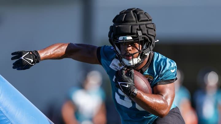 Jul 24, 2025; Jacksonville, FL, USA; Jacksonville Jaguars running back Bhayshul Tuten (33) participates in training camp at Miller Electric Center. Mandatory Credit: Nathan Ray Seebeck-Imagn Images