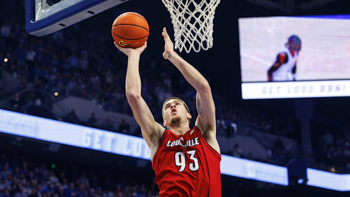 Dec 14, 2024; Lexington, Kentucky, USA; Louisville Cardinals forward Noah Waterman (93) goes to the basket during the first half against the Kentucky Wildcats at Rupp Arena at Central Bank Center. Dec 14, 2024; Lexington, Kentucky, USA; Louisville Cardinals forward Noah Waterman (93) goes to the basket during the first half against the Kentucky Wildcats at Rupp Arena at Central Bank Center.