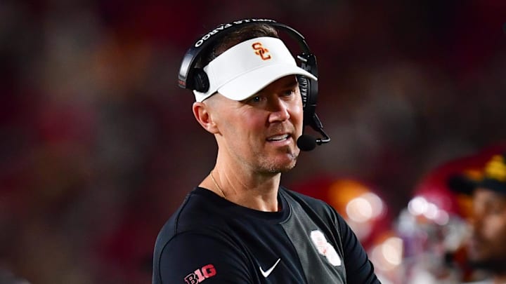 Sep 20, 2025; Los Angeles, California, USA; Southern California Trojans head coach Lincoln Riley speaks with the official during the second half at the Los Angeles Memorial Coliseum. Mandatory Credit: Gary A. Vasquez-Imagn Images